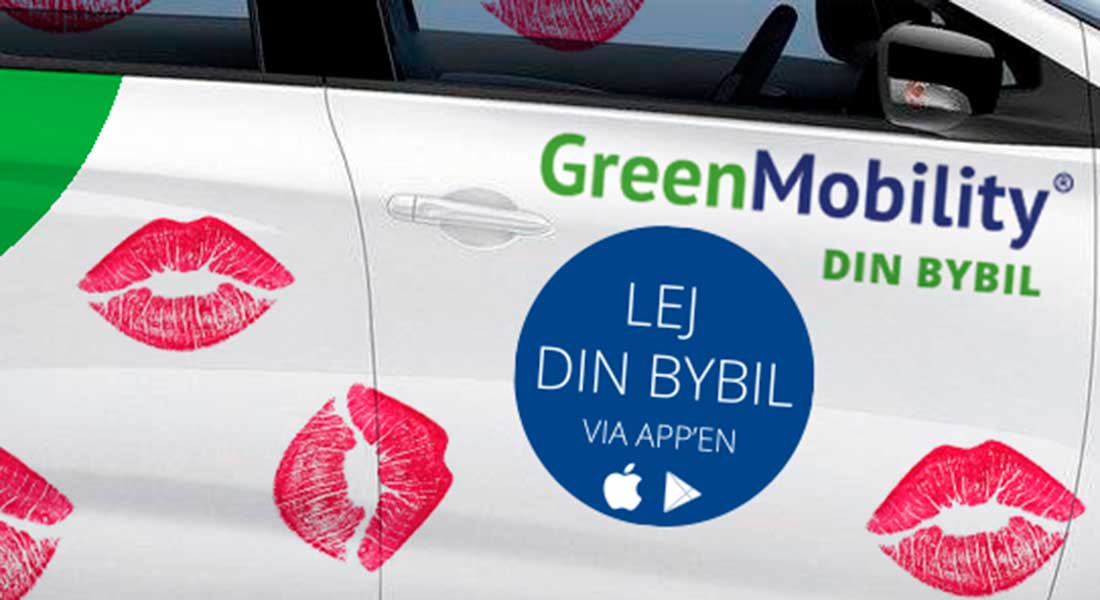 Green mobility car with red kisses